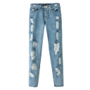 Light Wash Ripped Jeans in Zipper Fly