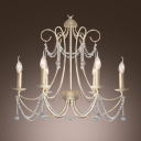 Brighten Up Your Home with Elegant Chandelier Features Graceful Curving Scrolls and Crystal Drops