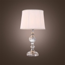 Clear Crystal Finish Table Lamp with White Shade Complements Classic and Contemporary Decors