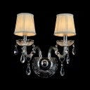 Enchanting Beige Fabric Shades and Clear Bobeches and Drops Add Glamour to Double Lights Wall Sconce