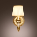 Eye-catching Wall Light Sconce Adorned with Brass Finish Details and Clear Crystal Ball