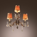 Sophisticates Three Light Wall Sconce Features Wrought Iron Scrolling Arms And Crystal Drops