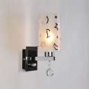 Contemporary Chrome Finish Crystal Accented Single Light Wall Sconce with Moon-Star Pattern Glass Shade