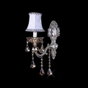Sophisticated Single Light Wall Sconce Features Delicate Back Plate and Fabric Hardback Shade