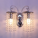 Sparkling Wall Light Fixture Adorned with Graceful Scrolling Arms in Chrome Finish and Beautiful Clear Crystal Falls
