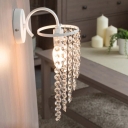 Lavish Single Light Wall Sconce Features Elegant All White Finish and Dazzling Strands of  Clear Crystal Beads