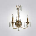 Elegant Scrolls and Graceful Scrollings Create Timeless Two-light Crystal Wall Sconce