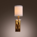 Contemporary Simple Wall Sconce Complete with Gold Finish and White Fabric Drum Shade