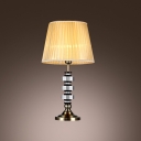 Sparkling Crystal Cubes Create Contemporary Look in Table Lamp Topped with Pleated Orange Fabric Shade