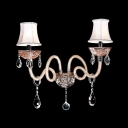 A Handsome Traditional Wall Sconce Complete with Scrolling Arms and Crystal Drops