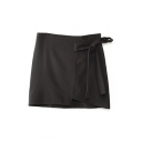 Black Bow Tie Front Mini Skirt with Asymmetrical Hem