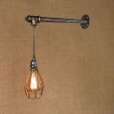 Industrial Wall Sconce with Metal Cage Shade and Hanging Cord in Bronze