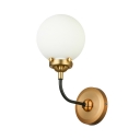 1-Light LED Wall Sconce in Antique Brass with Frosted Shade