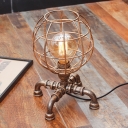 Industrial 9''W Table Lamp with Globe Metal Cage and Pipe Lamp Base, Antique Brass
