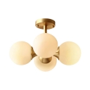 Frosted Glass Globe Semi Ceiling Mount Light 4 Lights European Style Ceiling Lamp in Brass for Shop