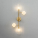 Contemporary Linear Wall Light with Cylinder and Globe Shade 4 Lights Metal Sconce Light in Brass for Hotel