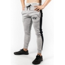 Men's Trendy Logo Printed Colorblock Patched Side Drawstring Waist Casual Training Pants Pencil Pants