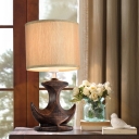 White/Tan Cylinder Desk Lamp Classic Fabric 1 Bulb Table Light with Ceramic Sailboat Base