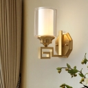 1 Head Cylinder Wall Lamp Modernist Stylish Brass Finish Clear Glass Wall Sconce with White Inner Glass Shade