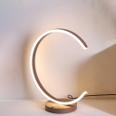 Minimalist Curved Task Lighting Acrylic LED Small Desk Lamp in Coffee with Round Metal Base, White/Warm Light