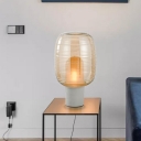 Contemporary 1 Head Table Light White Cylindrical Nightstand Lamp with Amber Glass Shade