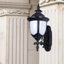 1-Head Wall Lighting Lodges Courtyard Wall Mount Fixture with Urn Milky Plastic Shade in Black