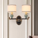Black 1/2-Light Wall Sconce Farmhouse Beige Fabric Drum Wall Lamp Fixture for Bedside