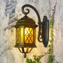 Black 1 Head Sconce Light Fixture Lodge Metal Birdcage Wall Lighting with Yellow Glass Shade