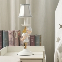 Resin Baby Angel Nightstand Light Kids 1-Light White and Gold Table Lamp with Bell Fabric Shade