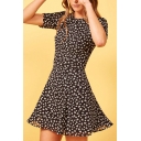 Boutique Womens Ditsy Floral Print Short Sleeve Crew-neck Cut out Back Short Pleated A-line Dress in Black