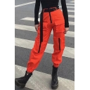 Cool Stylish Street Girls' Mid Rise Buckle Ribbon Patch Side Pocket Contrasted Cuffed Ankle Relaxed Tapered Cargo Pants in Red