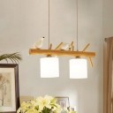 Opaque Glass Cylinder Island Light Asian 2/3-Light Beige Hanging Pendant with Bird Decor and Wood Arm