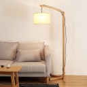 Dangling Drum Shade Floor Light Minimalist Fabric 1 Head Beige Stand Up Lamp with Oblique Arm and 3-Prong Stand