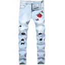 Fancy Men's Jeans Distressed Hole Rose Embroidered Button Fly Mid Waist Regular Fitted Long Jeans with Light Washing Effect
