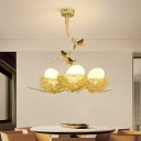 Cream Glass Egg Ceiling Fixture Artistic Gold Chandelier Light with Nest and Bird Decoration