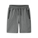 Modern Shorts Pure Color Zipped Pockets Mid Rise over The Knee Loose Fitted Shorts for Men