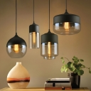 Black Clear Glass Pendant Light with Adjustable Hanging Length and Round Canopy, Modern Style