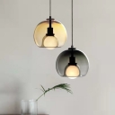 Modern Clear Glass Pendant with Adjustable Hanging Length and Cord Mounting