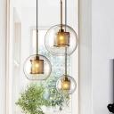 Sleek and Modern Metal Pendant Light with Clear Glass Shade for Elegant Home Decor