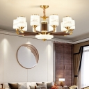 Modern Sleek Metal Chandelier with Glass Shades and Adjustable Hanging Length in Gold