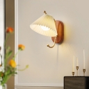 Elegant Ceramic Shade 1-Light LED Wall Sconce with Sleek Metal Design