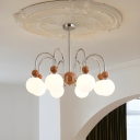 Sleek Stainless Steel Chandelier with Adjustable Hanging Length and Opalescent Glass Shades