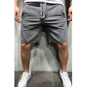 Men Sporty Shorts Solid Color Mid Rise Drawstring Waist Front Pocket Shorts