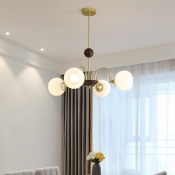 Contemporary Gold Chandelier with Opalescent Glass Shades and Adjustable Hanging Length