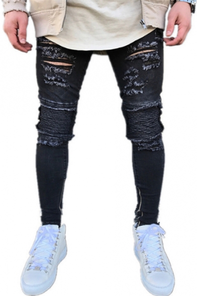 guy in ripped jeans