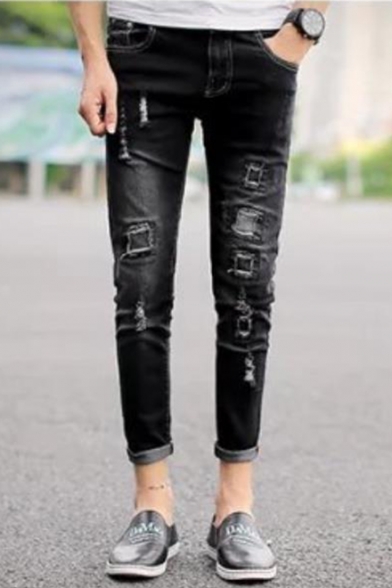 black ripped cuffed jeans