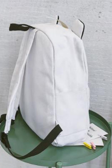 white canvas backpack