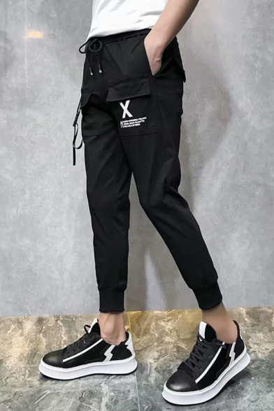 Men's Trendy Letter X Printed Flap Pocket Front Ribbon Embellished Drawstring Waist Black Casual Cargo Pants