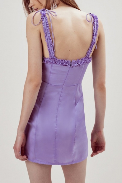 purple frilly dress