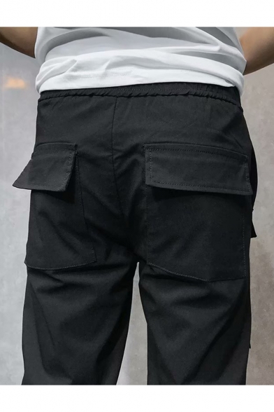 Men's Trendy Letter X Printed Flap Pocket Front Ribbon Embellished Drawstring Waist Black Casual Cargo Pants